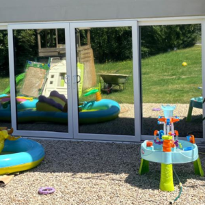 Bi-fold doors fitted with Silver 20 internal solar control window film to help reduce heat and glare.
