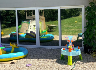 Bi-fold doors fitted with Silver 20 internal solar control window film to help reduce heat and glare.