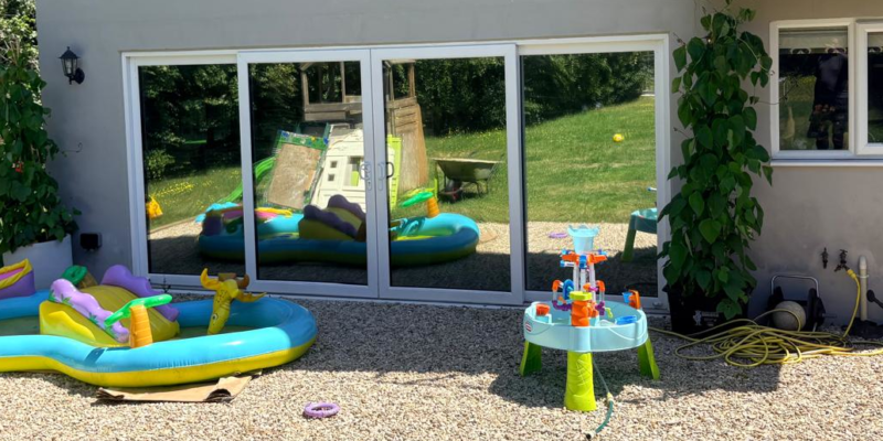 Bi-fold doors fitted with Silver 20 internal solar control window film to help reduce heat and glare.