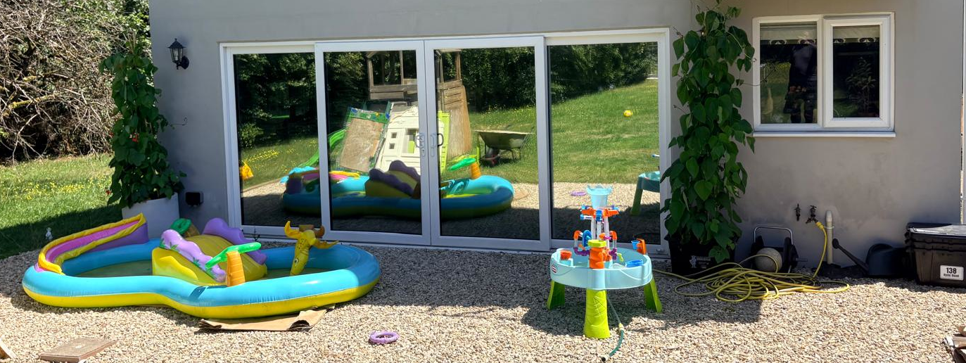 Bi-fold doors fitted with Silver 20 internal solar control window film to help reduce heat and glare.